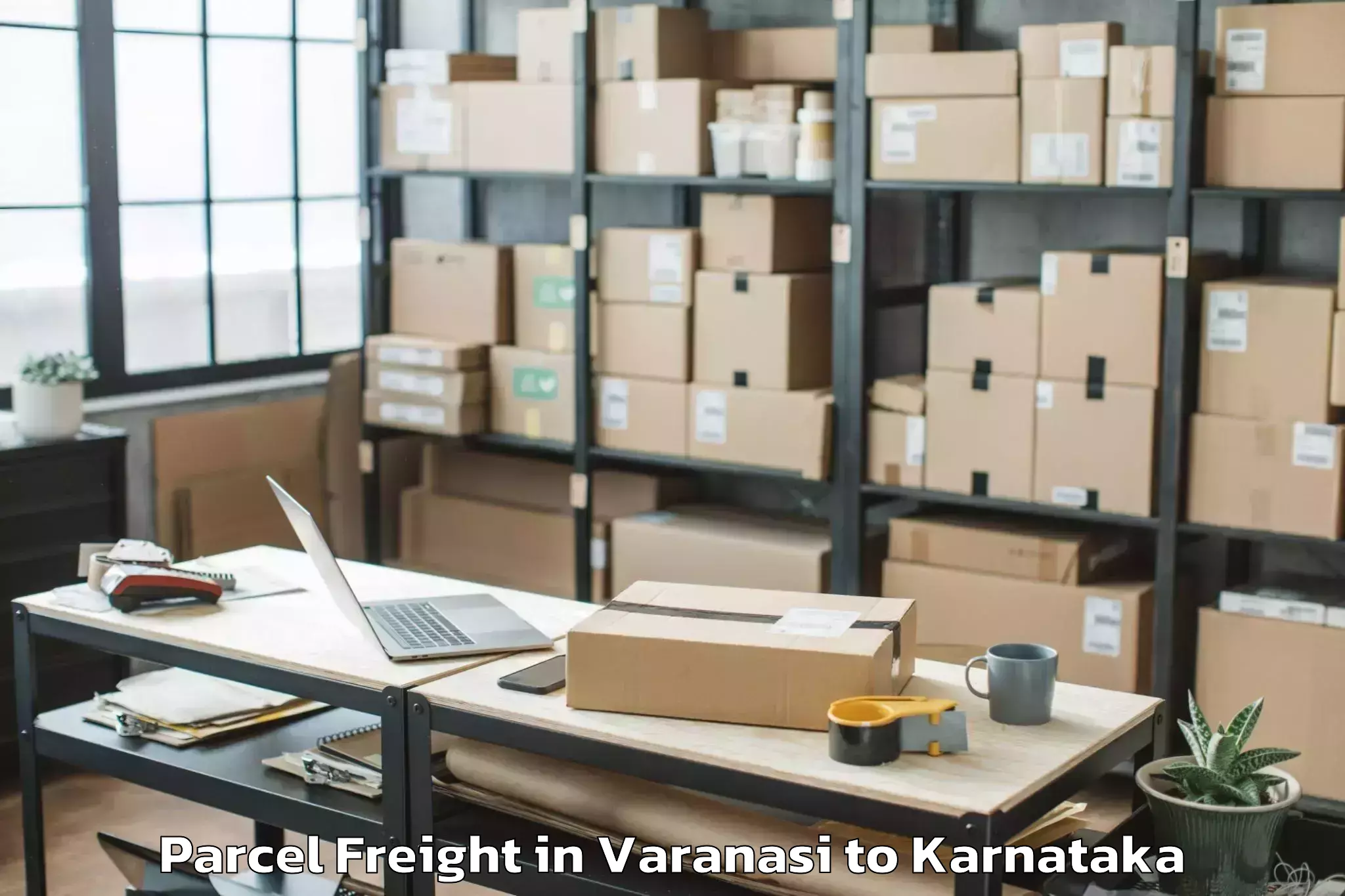 Book Varanasi to Ponnampet Parcel Freight Online